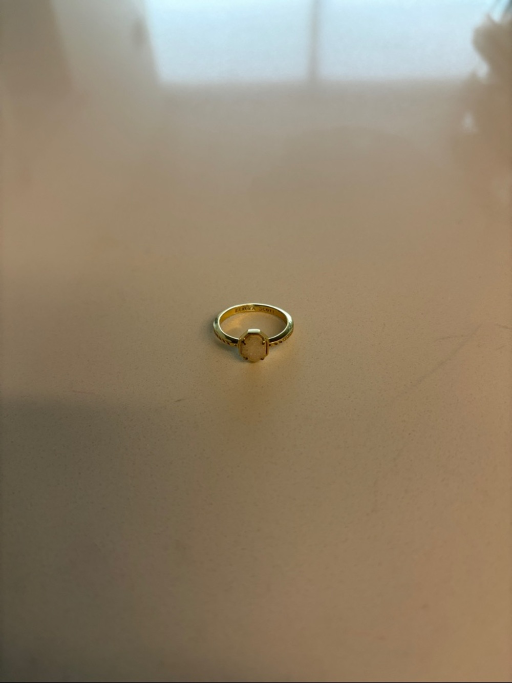 Gold Ring with Oval Cream Stone
